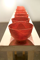 red bowls in line